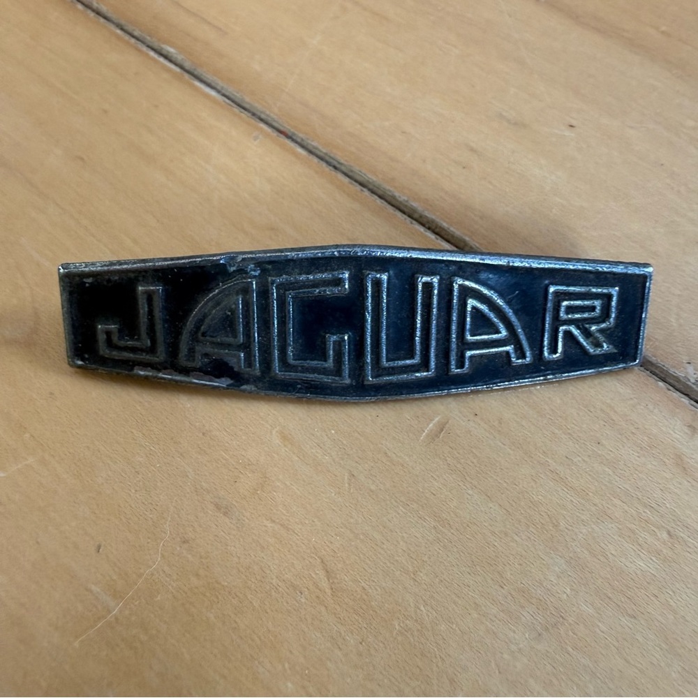Jaguar Black and Silver vintage emblem